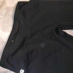 Fabletics black leggings with zipper pocket